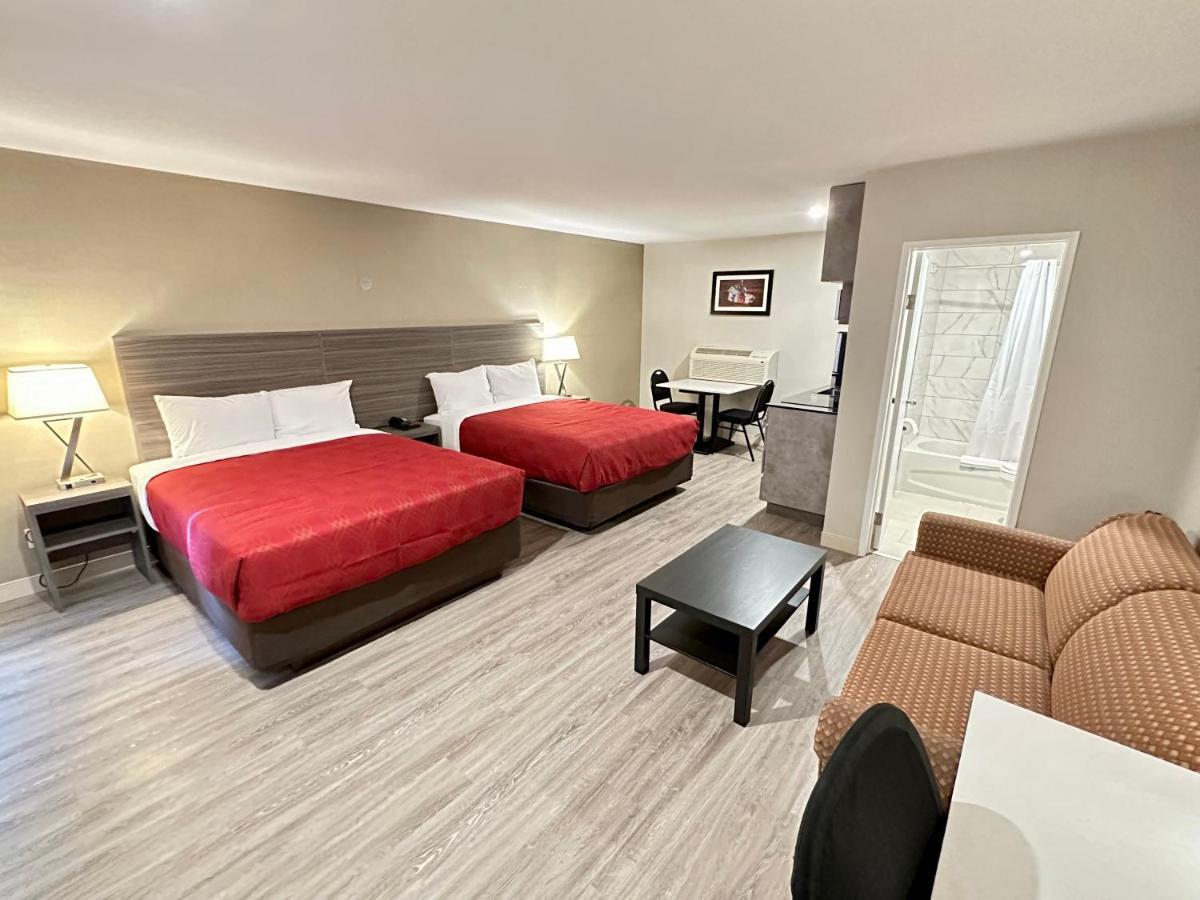 Econo Lodge Inn & Suites Пинчер-Крик Экстерьер фото