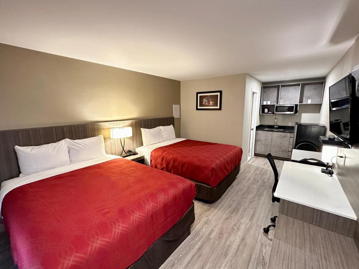 Econo Lodge Inn & Suites Пинчер-Крик Экстерьер фото
