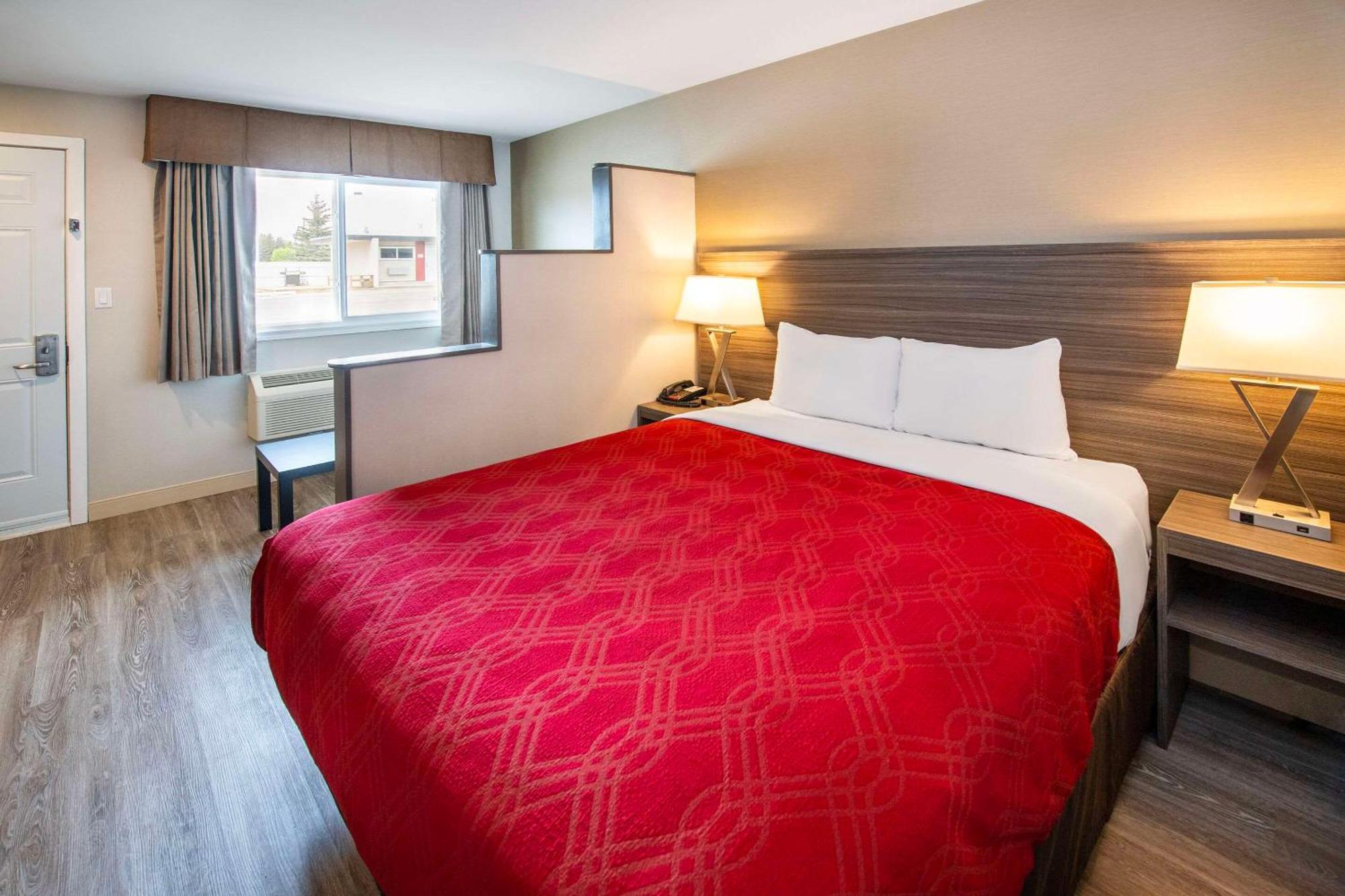 Econo Lodge Inn & Suites Пинчер-Крик Экстерьер фото